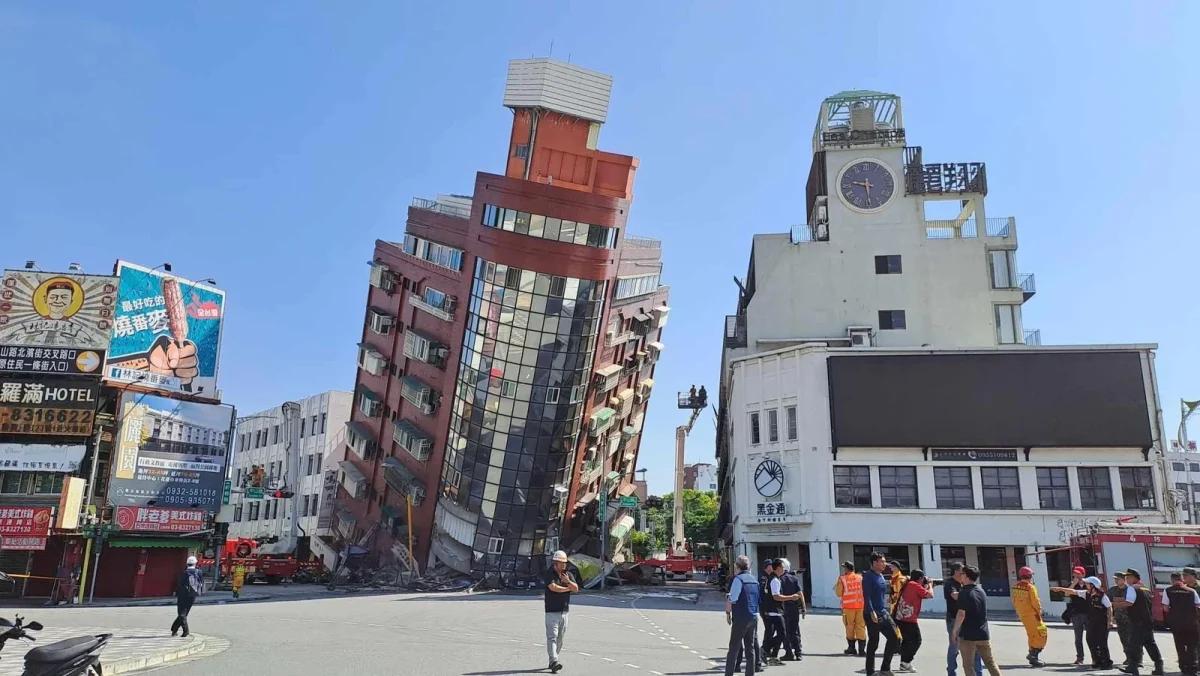 A red building that has partially collapsed