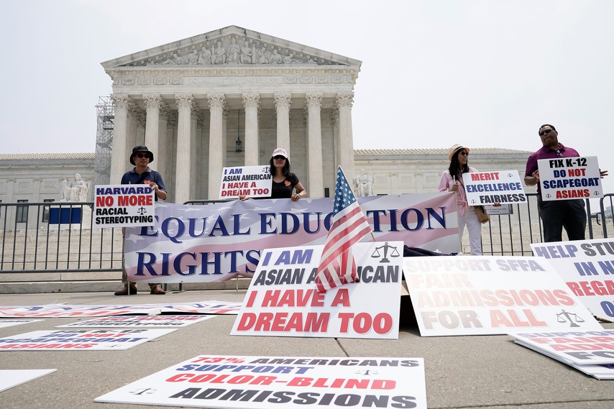 People protest outside of the Supreme Court in Washington, Thursday, June 29, 2023. The Supreme Court on Thursday struck down affirmative action in college admissions, declaring race cannot be a factor and forcing institutions of higher education to look for new ways to achieve diverse student bodies. (AP Photo/Mariam Zuhaib)